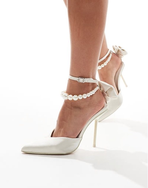 ‌Stylish Sariah bridal  pointed heels in ivory satin with pearl ankle strap and corsage detail