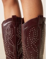 studded western knee boots in burgundy